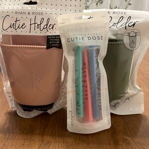 NWT, unopened Ryan & Rose bundle. Two Cutie Holders and one Cutie Dose.